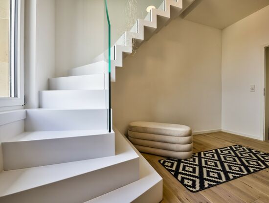 Faltwerktreppe in Corian "designerwhite"